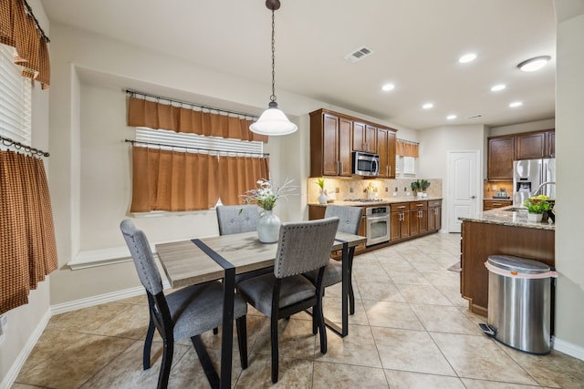 9721 Stripling Dr, Fort Worth, TX 76244 - dining space featuring recessed lighting, light tile patterned floors, and baseboards