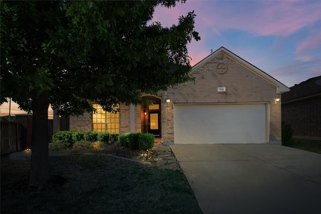 5532 Grayson Ridge Dr, Fort Worth, TX 76179 - view of front of property with brick siding, concrete driveway, and a garage