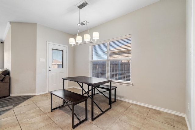 5532 Grayson Ridge Dr, Fort Worth, TX 76179 - dining room with light tile patterned floors and a chandelier