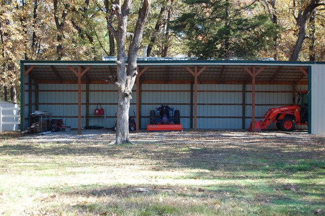 garage featuring a carport