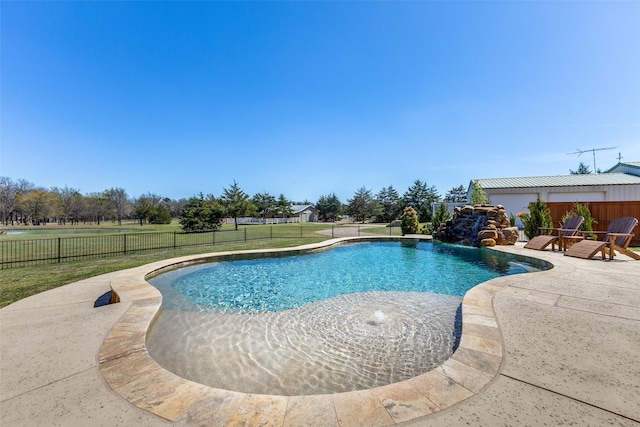 view of pool with a lawn, a fenced in pool, a fenced backyard, and a patio area