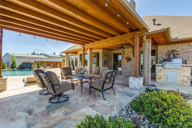 1752 County Road 1450, Bonham, TX 75418 - view of patio featuring exterior kitchen, a ceiling fan, fence, an outdoor living space, and a grill