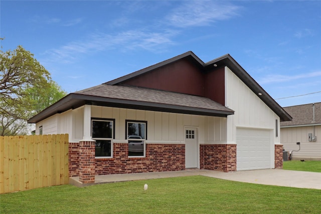 view of home's exterior featuring concrete driveway, fence, brick siding, a garage, and a yard