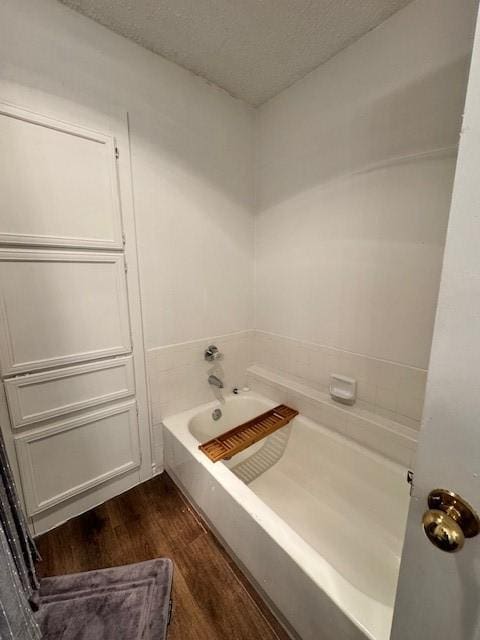 2411 Northlake Ct, Irving, TX 75038 - full bathroom featuring wood finished floors and a garden tub