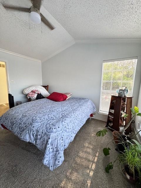 2411 Northlake Ct, Irving, TX 75038 - bedroom with crown molding, carpet flooring, a textured ceiling, ceiling fan, and lofted ceiling