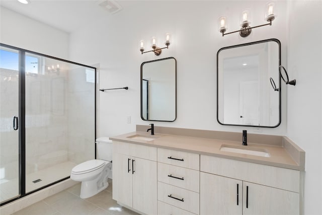 1804 Ripley St Unit 105, Dallas, TX 75204 - bathroom featuring toilet, a stall shower, double vanity, tile patterned floors, and recessed lighting