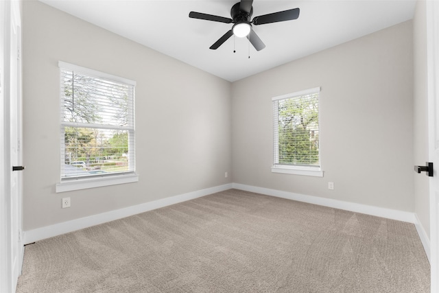 2111 Brookhaven Dr, Dallas, TX 75224 - unfurnished room featuring baseboards, carpet floors, and a ceiling fan