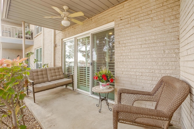 sunroom / solarium featuring ceiling fan and a healthy amount of sunlight