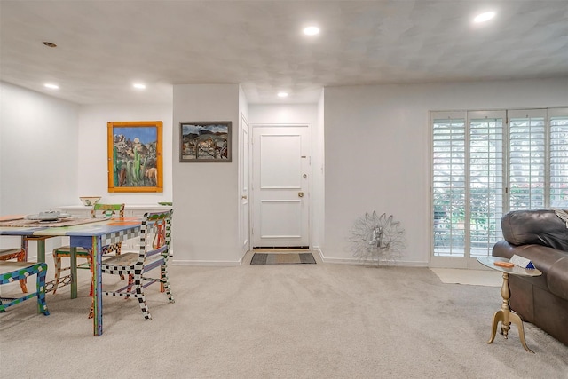 dining room with baseboards, carpet floors, and recessed lighting