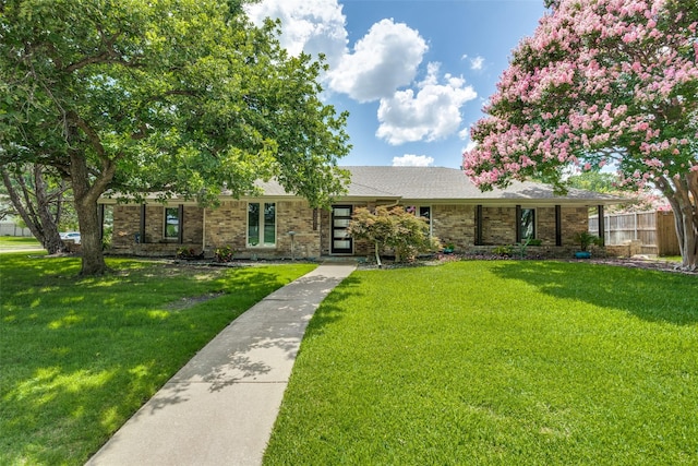3201 Canyon Creek Dr, Richardson, TX 75080 - single story home with brick siding