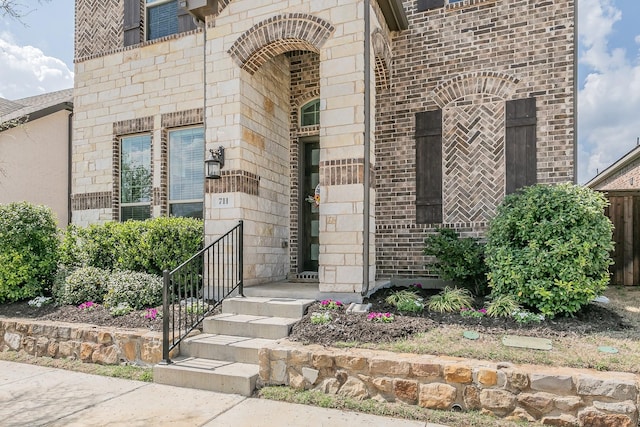 711 Artesian Dr, Argyle, TX 76226 - property entrance with brick siding and stone siding