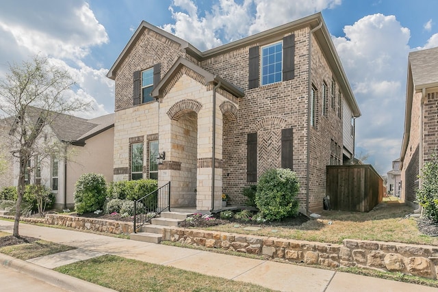 711 Artesian Dr, Argyle, TX 76226 - french country style house featuring brick siding and stone siding