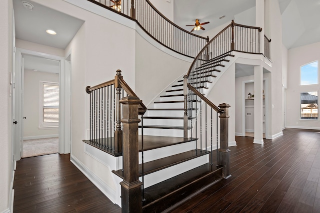 15664 Wild Cherry Ln, Fort Worth, TX 76262 - stairway featuring a ceiling fan, hardwood / wood-style floors, healthy amount of natural light, and a high ceiling