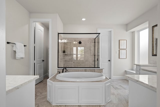 15664 Wild Cherry Ln, Fort Worth, TX 76262 - bathroom featuring a bath, vanity, baseboards, a shower stall, and recessed lighting