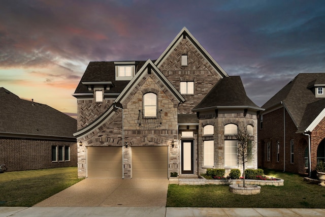 15664 Wild Cherry Ln, Fort Worth, TX 76262 - french country style house featuring concrete driveway, a yard, stone siding, and a garage
