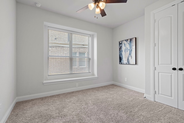 15664 Wild Cherry Ln, Fort Worth, TX 76262 - unfurnished bedroom featuring carpet floors, baseboards, and ceiling fan