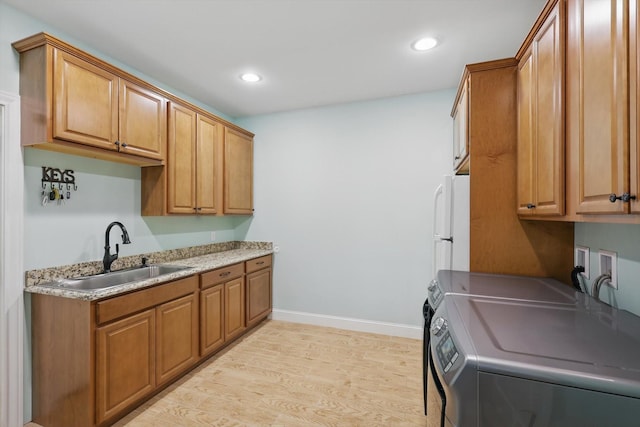 3713 Hidden Trl, Flower Mound, TX 75022 - laundry area with washing machine and clothes dryer, recessed lighting, cabinet space, and light wood-style floors