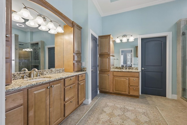 3713 Hidden Trl, Flower Mound, TX 75022 - bathroom with a shower stall, two vanities, crown molding, and tile patterned flooring