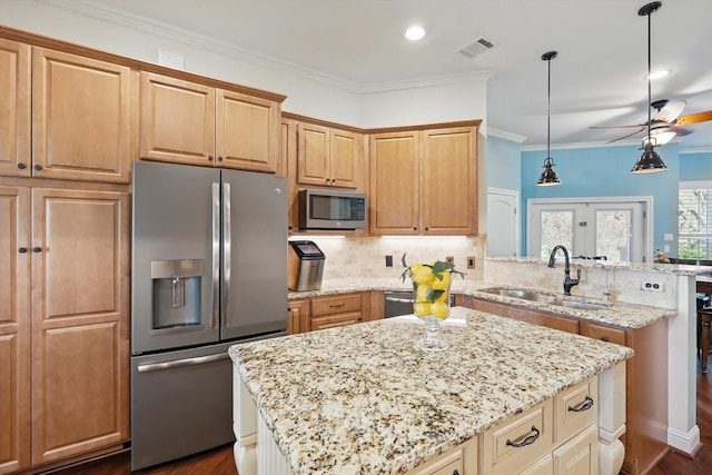 3713 Hidden Trl, Flower Mound, TX 75022 - kitchen featuring stainless steel appliances, a peninsula, light stone countertops, a ceiling fan, and tasteful backsplash