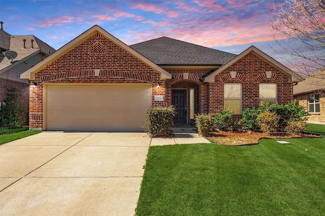 808 Goldenmist Dr, Little Elm, TX 75068 - french country inspired facade with brick siding, roof with shingles, driveway, an attached garage, and a front yard
