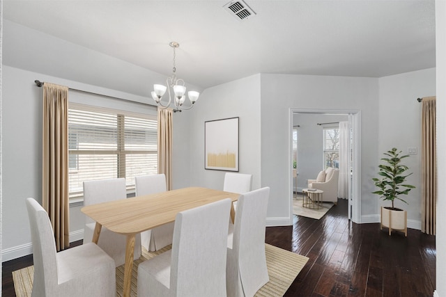 808 Goldenmist Dr, Little Elm, TX 75068 - dining space with a chandelier, dark wood-type flooring, and baseboards