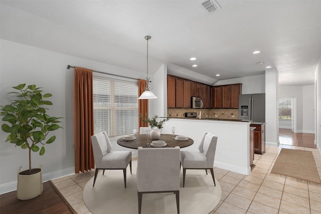 808 Goldenmist Dr, Little Elm, TX 75068 - dining area with light tile patterned floors, baseboards, and recessed lighting