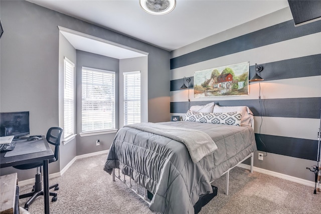 carpeted bedroom with baseboards and visible vents