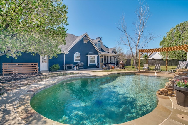 view of swimming pool with a fenced backyard, a fenced in pool, a patio, and a pergola