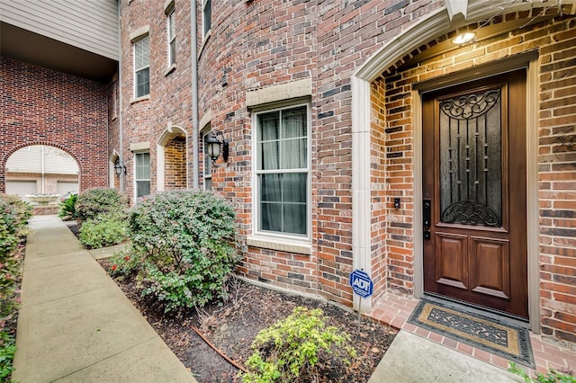3200 Ross Ave Unit 28, Dallas, TX 75204 - doorway to property with brick siding
