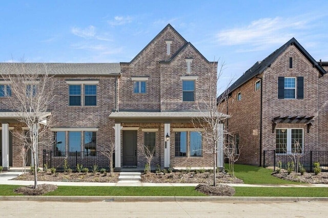 2412 Bulin Dr, Mansfield, TX 76063 - view of front of property featuring a porch and brick siding