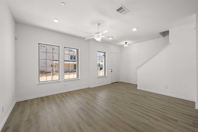 2412 Bulin Dr, Mansfield, TX 76063 - empty room featuring wood finished floors, ceiling fan, baseboards, and recessed lighting