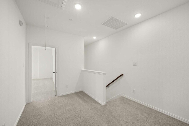 2412 Bulin Dr, Mansfield, TX 76063 - hallway featuring attic access, an upstairs landing, light carpet, recessed lighting, and baseboards