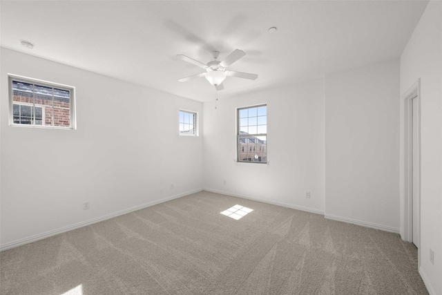2412 Bulin Dr, Mansfield, TX 76063 - carpeted spare room featuring a ceiling fan, baseboards, and a smoke detector