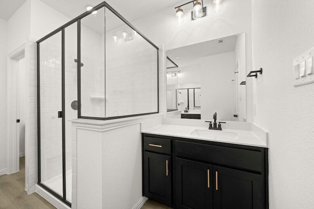 2412 Bulin Dr, Mansfield, TX 76063 - full bathroom with vanity, a shower stall, and wood finished floors