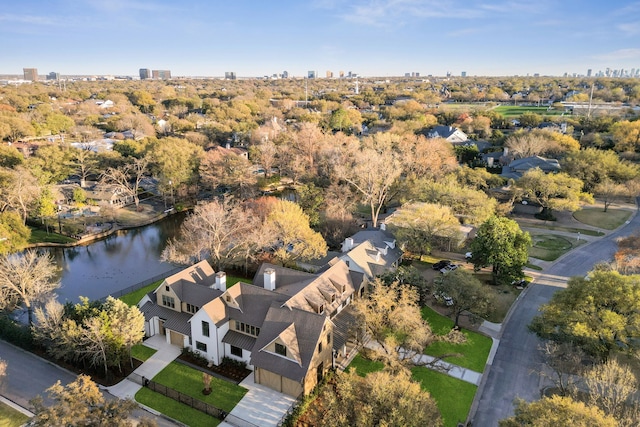 drone / aerial view with a view of city and a water view