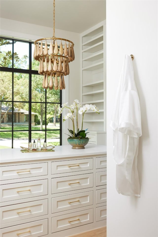 interior space featuring decorative light fixtures and an inviting chandelier