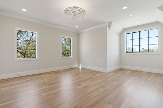 unfurnished room with light wood-style flooring, baseboards, recessed lighting, and ornamental molding