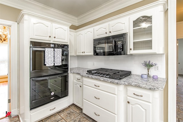 339 Hunters Holw, Bossier City, LA 71111 - kitchen with light stone counters, backsplash, white cabinetry, glass insert cabinets, and black appliances