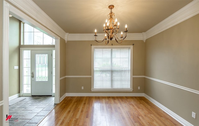 339 Hunters Holw, Bossier City, LA 71111 - entryway with baseboards, light wood-style floors, ornamental molding, and an inviting chandelier