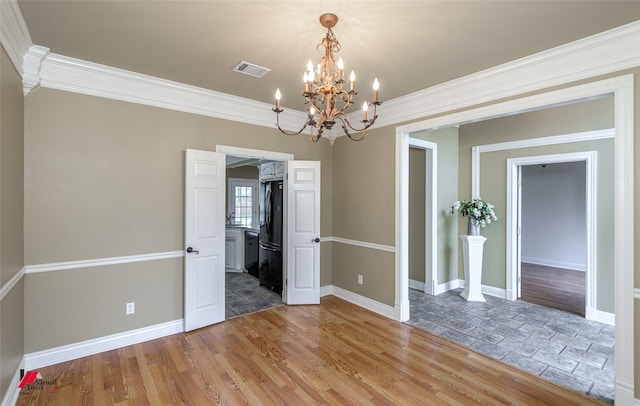 339 Hunters Holw, Bossier City, LA 71111 - empty room with baseboards, visible vents, light wood-style flooring, and a chandelier