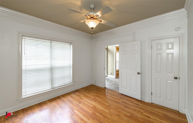 339 Hunters Holw, Bossier City, LA 71111 - unfurnished bedroom with baseboards, ornamental molding, and light wood finished floors