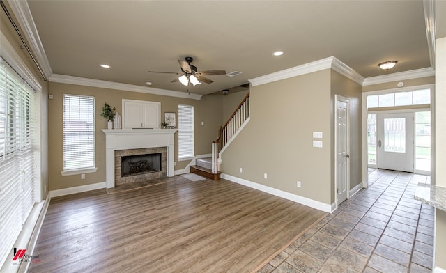 339 Hunters Holw, Bossier City, LA 71111 - unfurnished living room featuring ornamental molding, light wood-style flooring, and ceiling fan