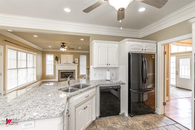 339 Hunters Holw, Bossier City, LA 71111 - kitchen with white cabinets, a peninsula, ceiling fan, a sink, and black appliances