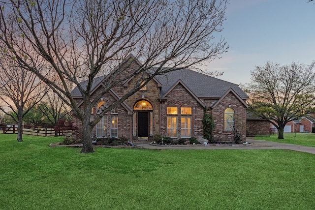 4500 Upper Glenwick Ct, Denton, TX 76226 - view of front of house featuring a yard, brick siding, fence, and roof with shingles