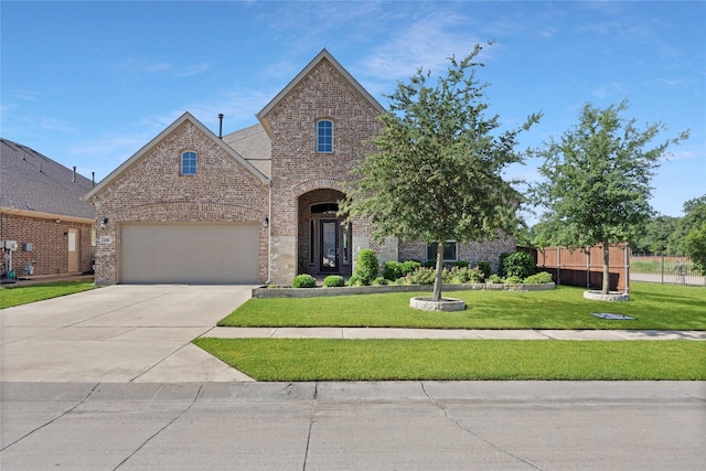 216 Equestrian Rd, Hickory Creek, TX 75065 - view of front facade featuring brick siding, concrete driveway, and an attached garage