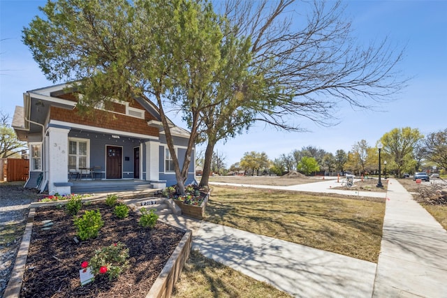 316 S Winnetka Ave, Dallas, TX 75208 - view of front of house featuring covered porch