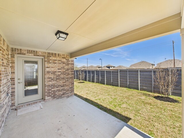 view of patio with a fenced backyard