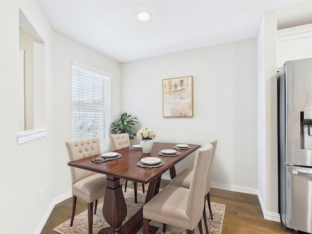 dining area with dark wood-style flooring, recessed lighting, and baseboards