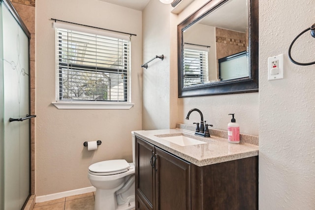 10319 Sylvia Dr, Dallas, TX 75228 - full bath with tile patterned flooring, vanity, toilet, a shower with door, and a textured wall