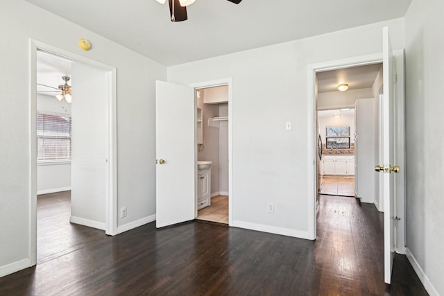 10319 Sylvia Dr, Dallas, TX 75228 - unfurnished bedroom with dark wood finished floors, baseboards, and ceiling fan